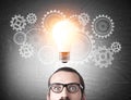 Man`s head, cogs and light bulb Royalty Free Stock Photo